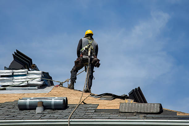 Professional Gutter Installation technician working in Kewadin, MI